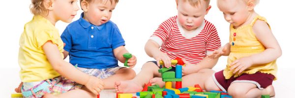 Playgroup-toddler-with-toy-blocks