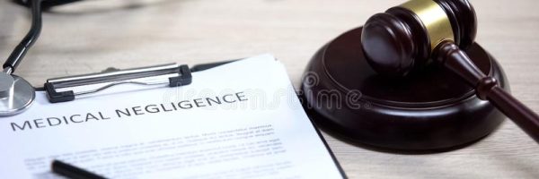 medical-negligence-stethoscope-table-gavel-lying-sound-block-stock-photo-medical-negligence-stethoscope-table-160852796