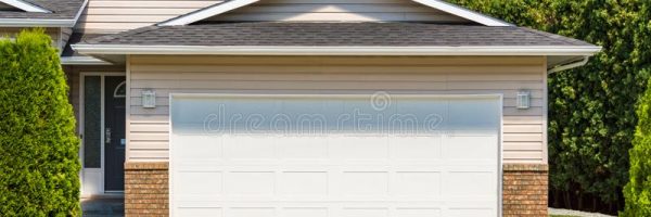 wide-garage-door-residential-house-concrete-driveway-front-white-wide-garage-door-residential-house-concrete-147946129